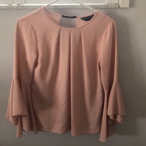 Beautiful dainty blush blouse with bell sleeves